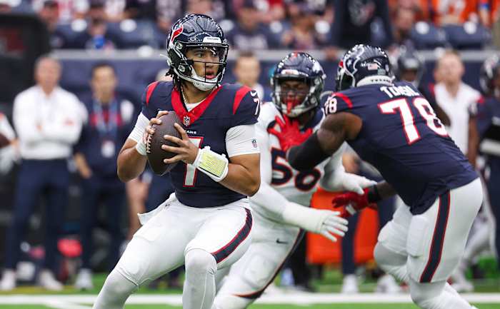 Texans quarterback C.J. Stroud looks for an open receiver during the first quarter against the Denver Broncos at NRG Stadium.